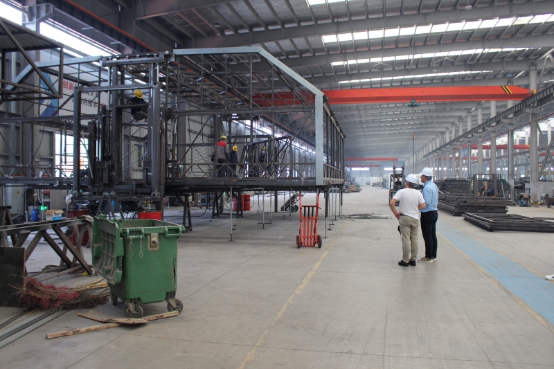 german-customer-visits-expandable-event-trailer-factory.jpg